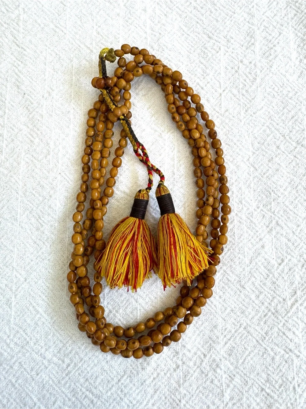 Meditation Beads: Knotted Chord with Small Beaded Sections and Tassels.